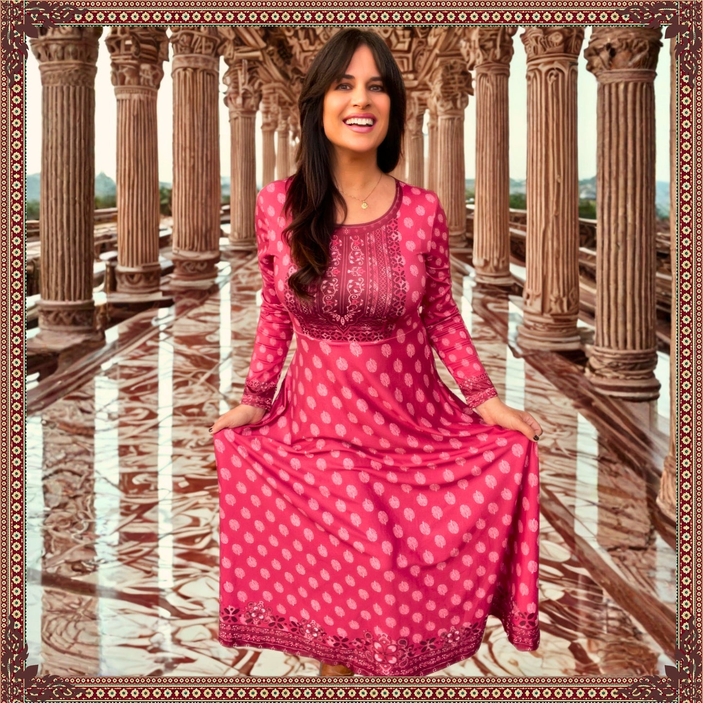 Woman wearing the Rani Rouge Jaipur Kurta Dress, a red-pink bohemian maxi dress featuring original FAVIE artwork inspired by Jaipur.